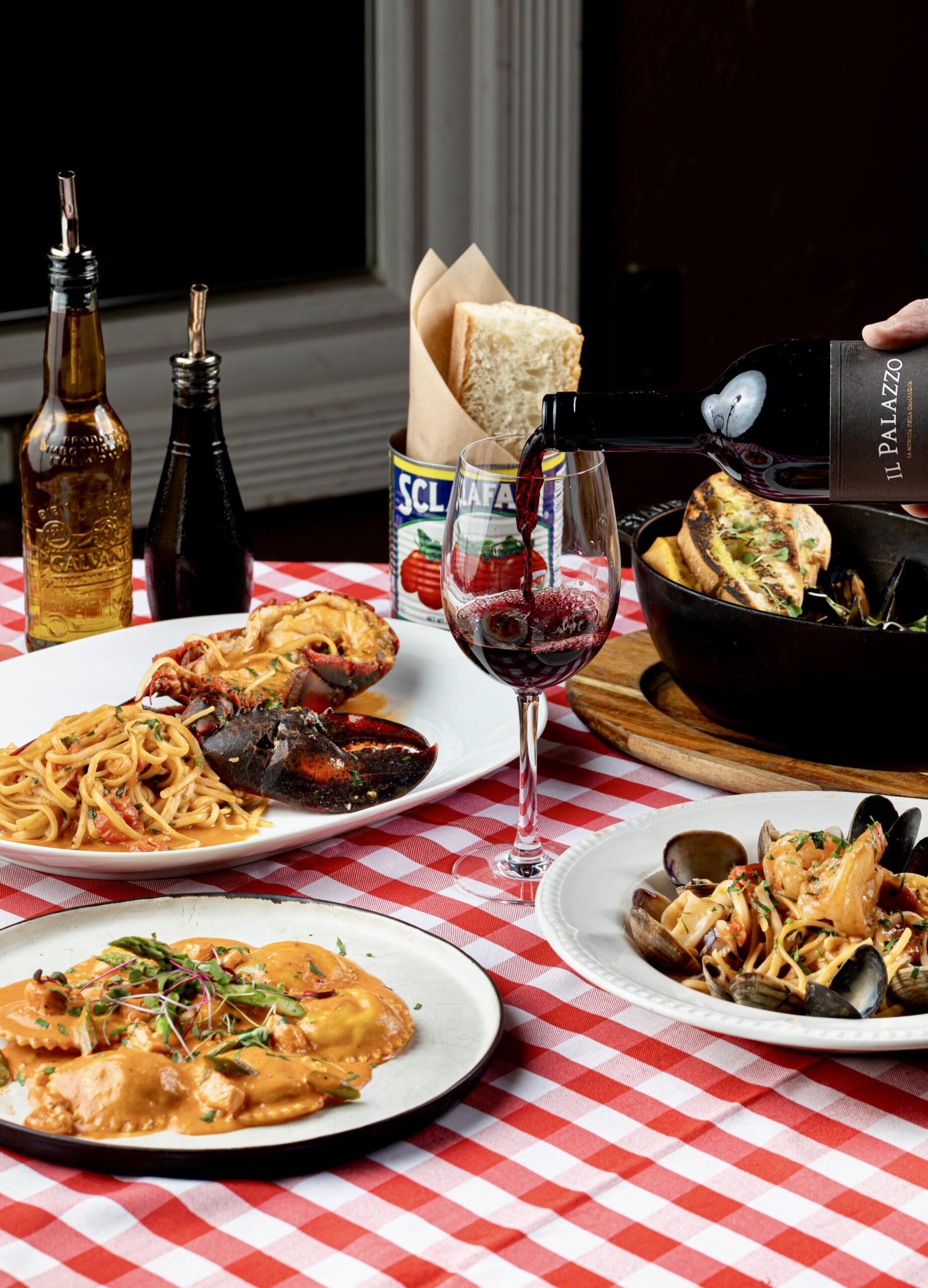 Italian seafood spread at Mercato della Pescheria South Beach, featuring Cacio e Pepe and fresh Branzino for post-SOBE WFF dining.